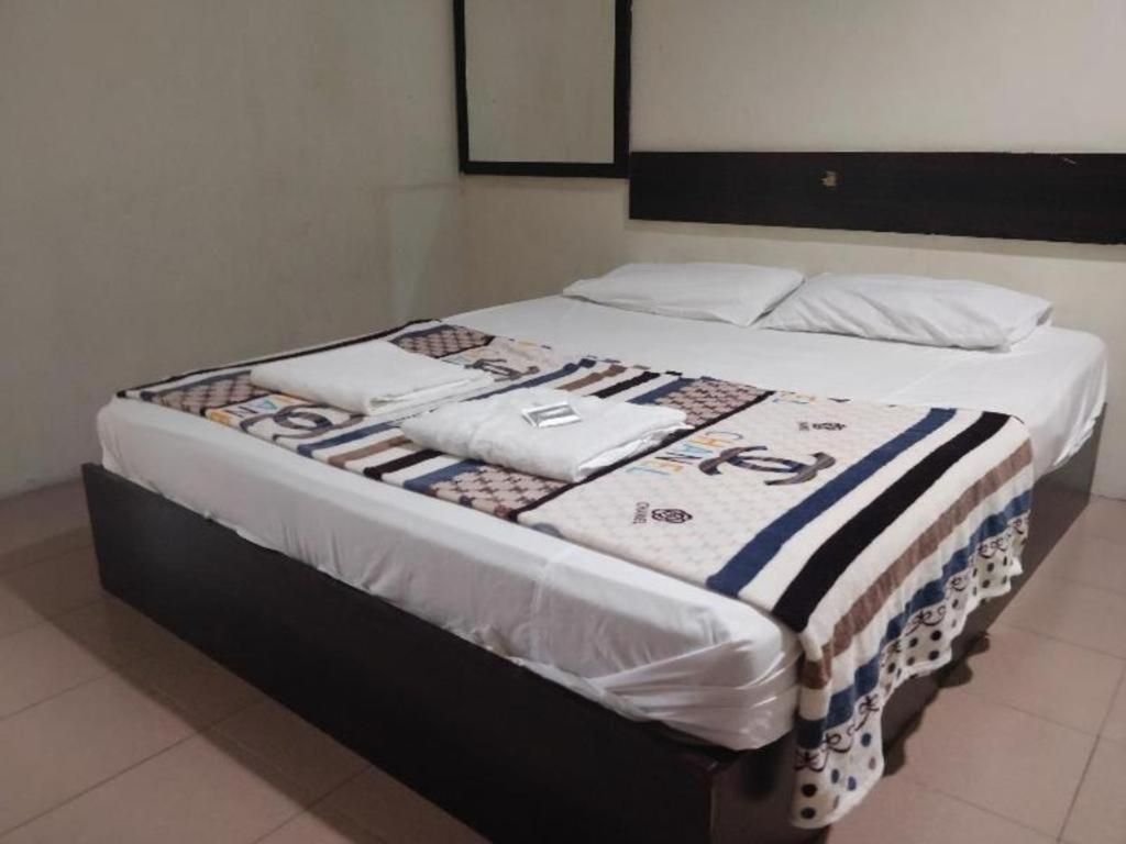 Spot On 89907 Motel Impian Сери Манджунг Екстериор снимка