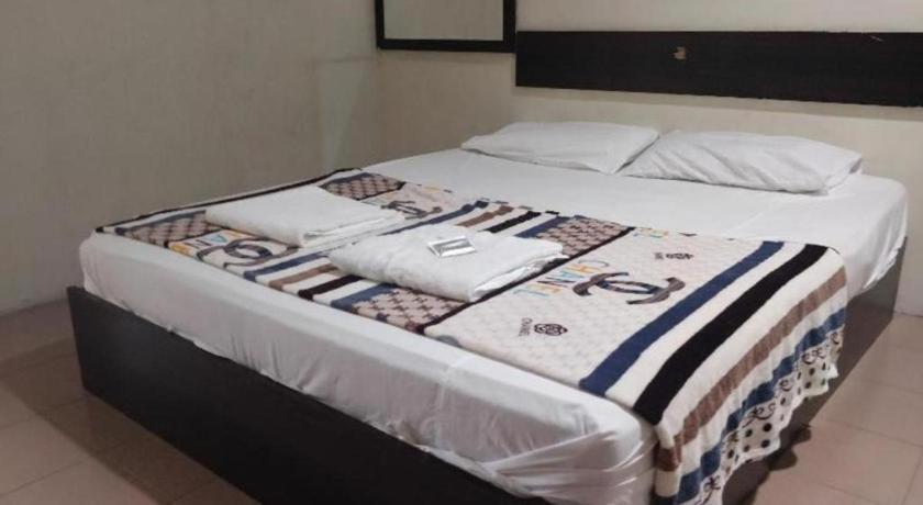 Spot On 89907 Motel Impian Сери Манджунг Екстериор снимка