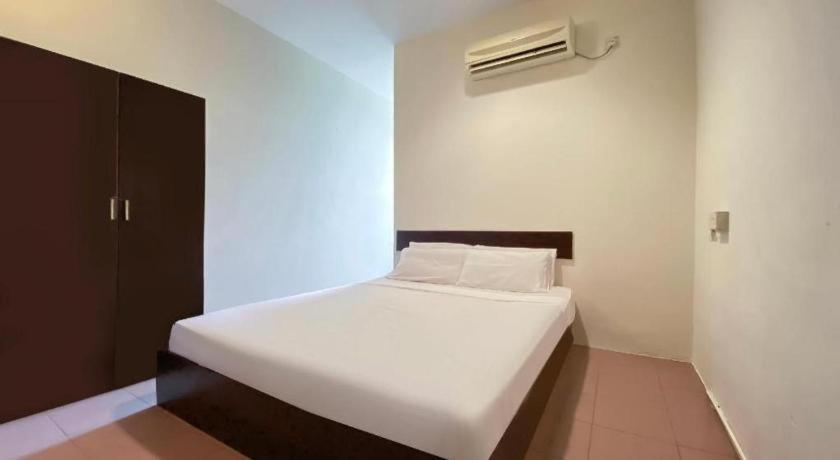 Spot On 89907 Motel Impian Сери Манджунг Екстериор снимка